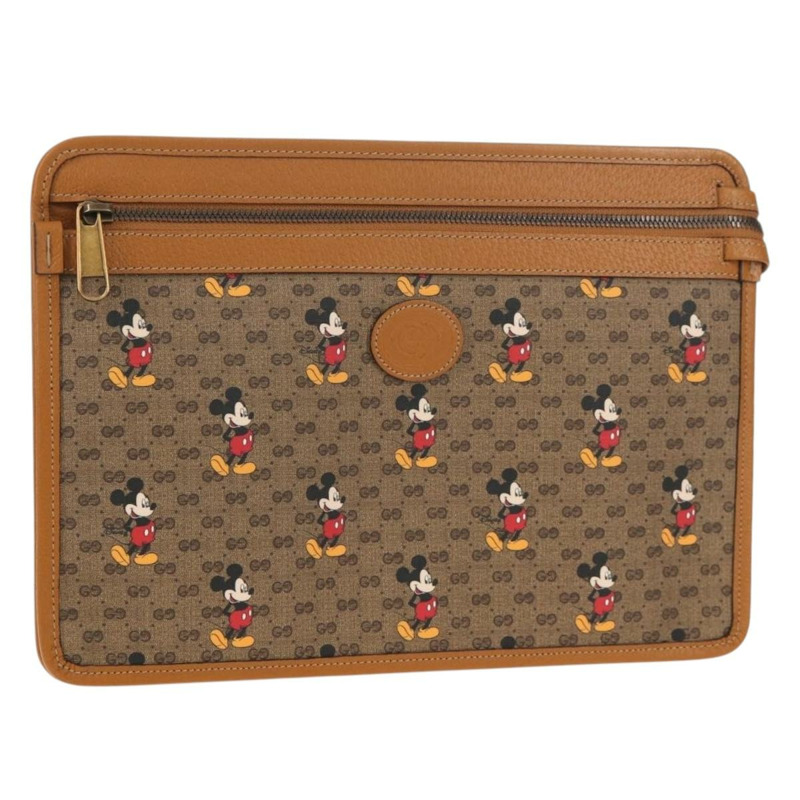 【日本直送】GUCCI GUCCIxDisney GG Supreme 手拿包 PVC 米色金色 602552 正品 152362M-0