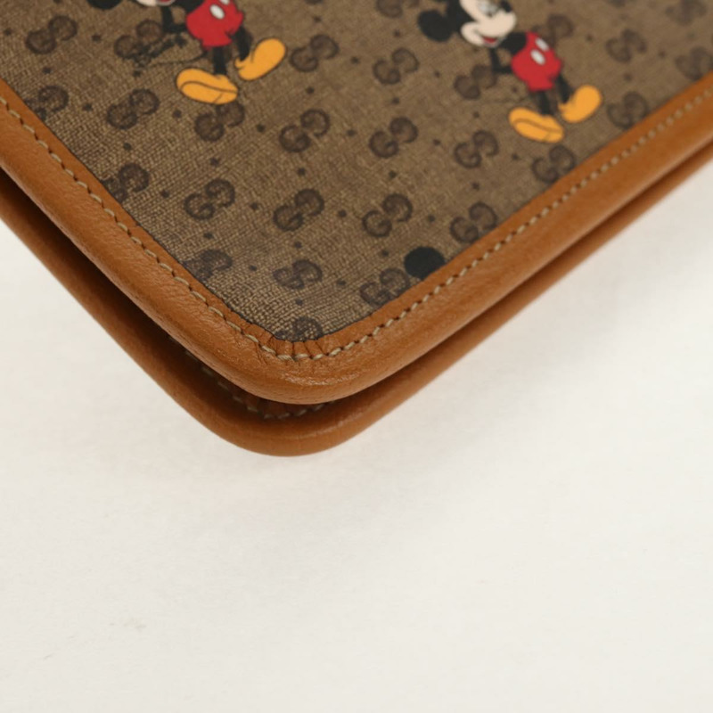 【日本直送】GUCCI GUCCIxDisney GG Supreme 手拿包 PVC 米色金色 602552 正品 152362M-6