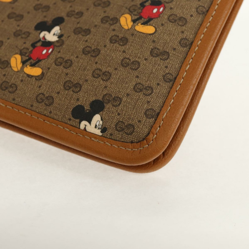 【日本直送】GUCCI GUCCIxDisney GG Supreme 手拿包 PVC 米色金色 602552 正品 152362M-15