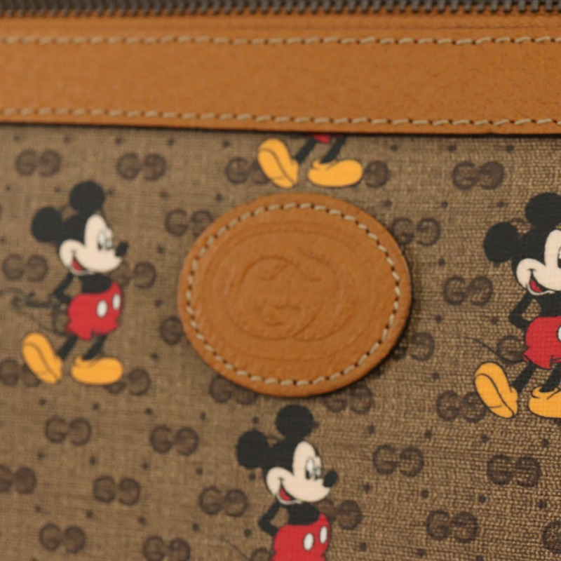 【日本直送】GUCCI GUCCIxDisney GG Supreme 手拿包 PVC 米色金色 602552 正品 152362M-16