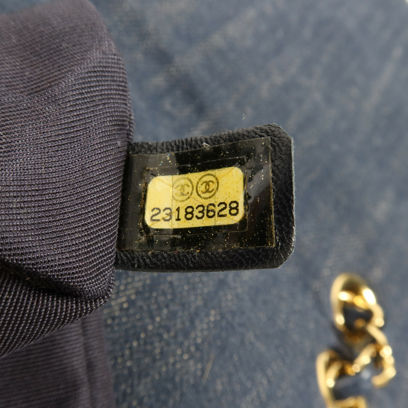 CHANEL 牛仔布Backpack金扣背包-11