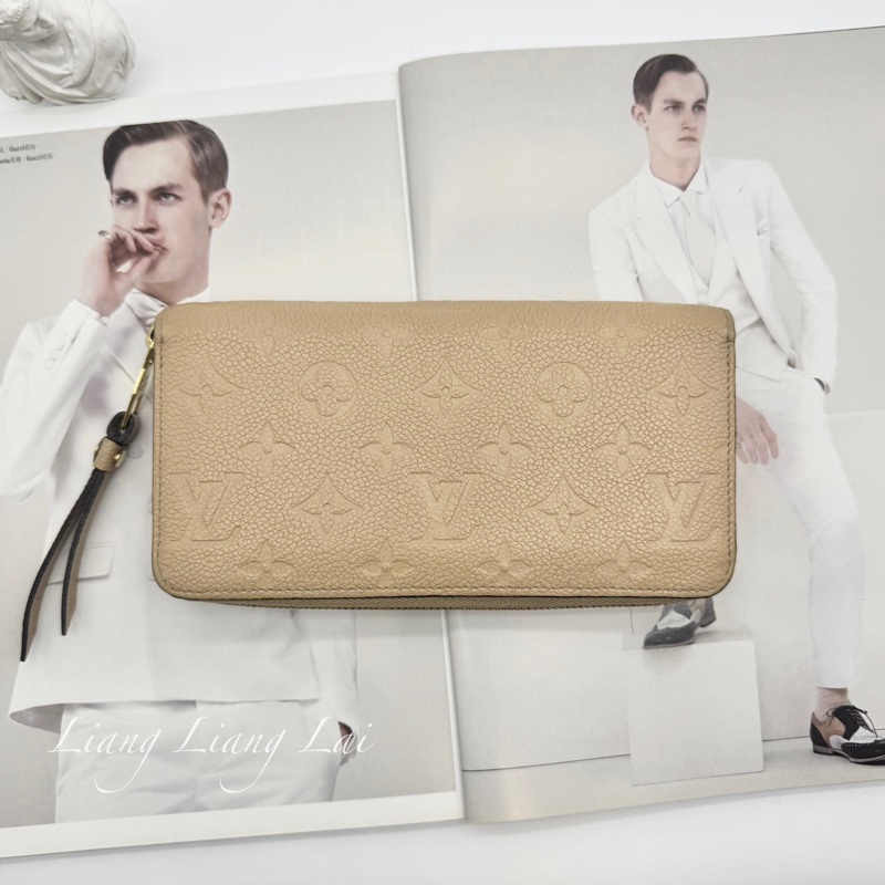 Louis Vuitton LV Monogram Empreinte 壓紋牛皮米色拉鍊長夾-0