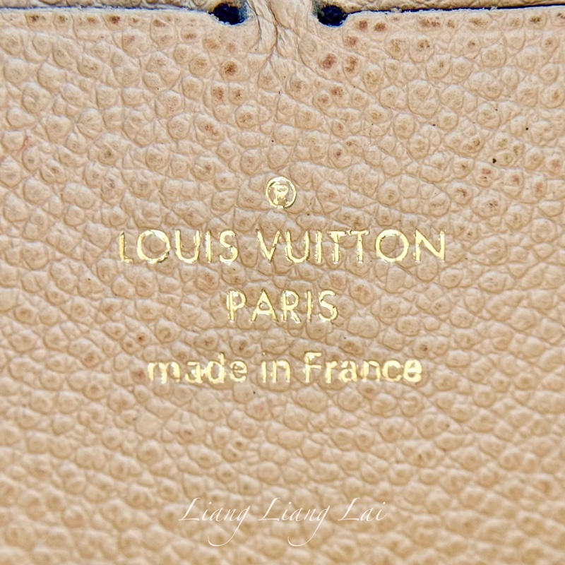 Louis Vuitton LV Monogram Empreinte 壓紋牛皮米色拉鍊長夾-2