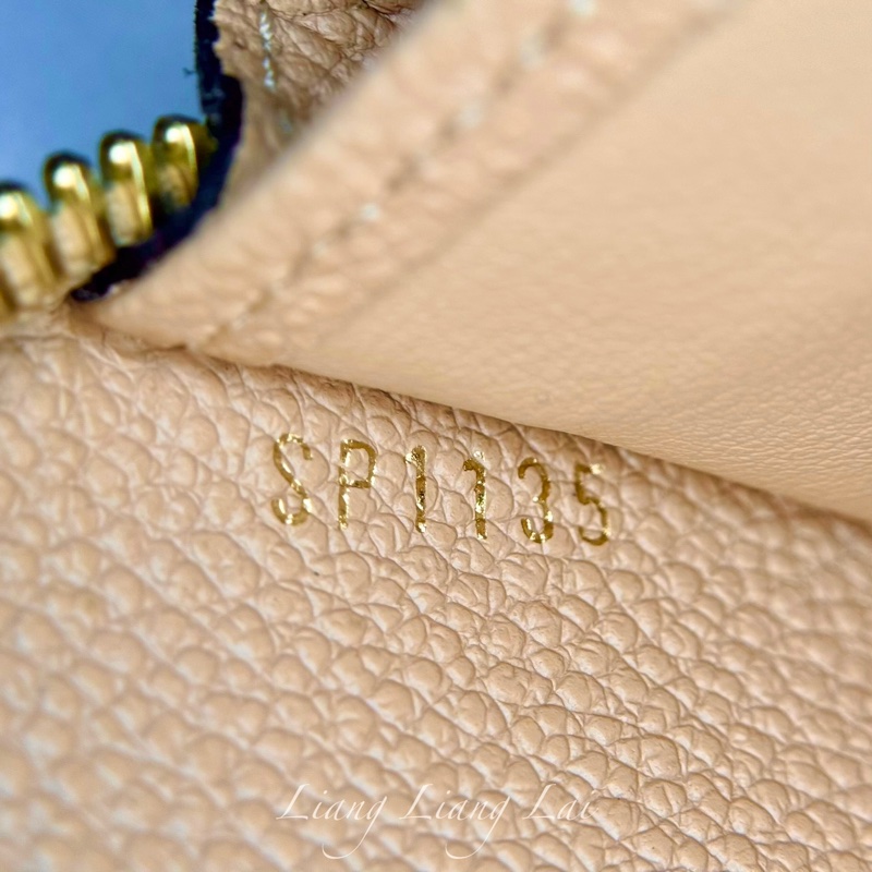 Louis Vuitton LV Monogram Empreinte 壓紋牛皮米色拉鍊長夾-3