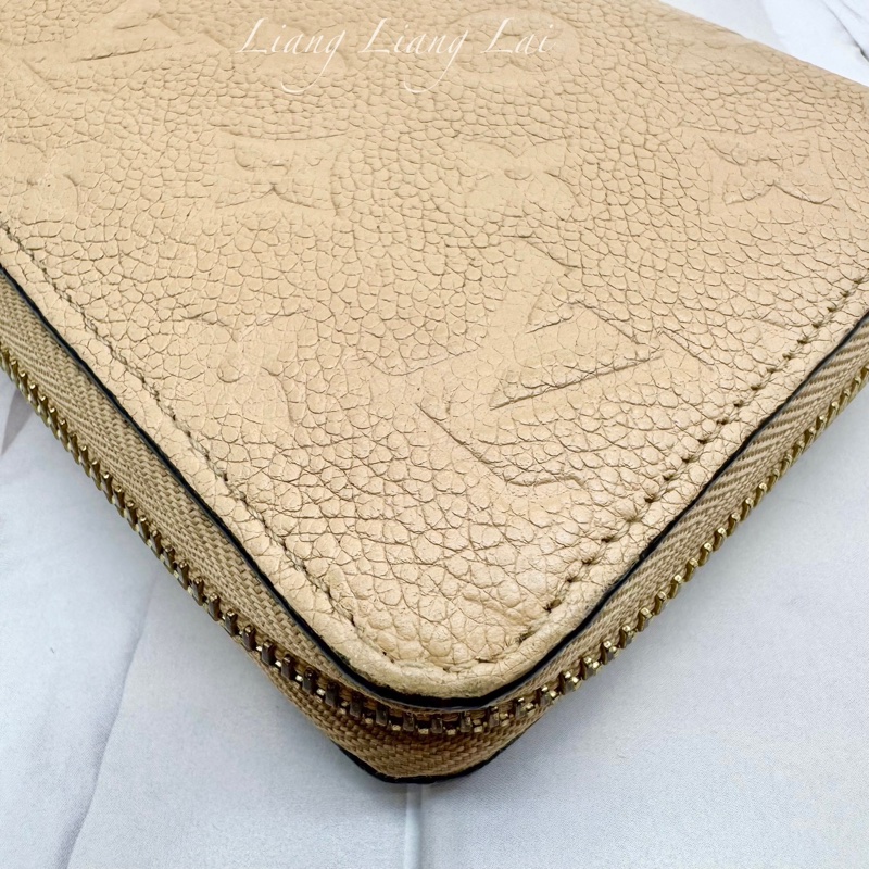 Louis Vuitton LV Monogram Empreinte 壓紋牛皮米色拉鍊長夾-24