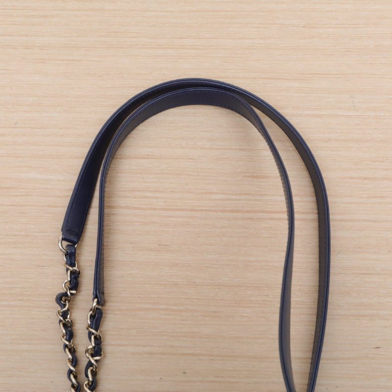 CHANEL Duma抽繩口蓋雙肩包雙口袋藍色牛皮晶片開淺金扣肩背包-2