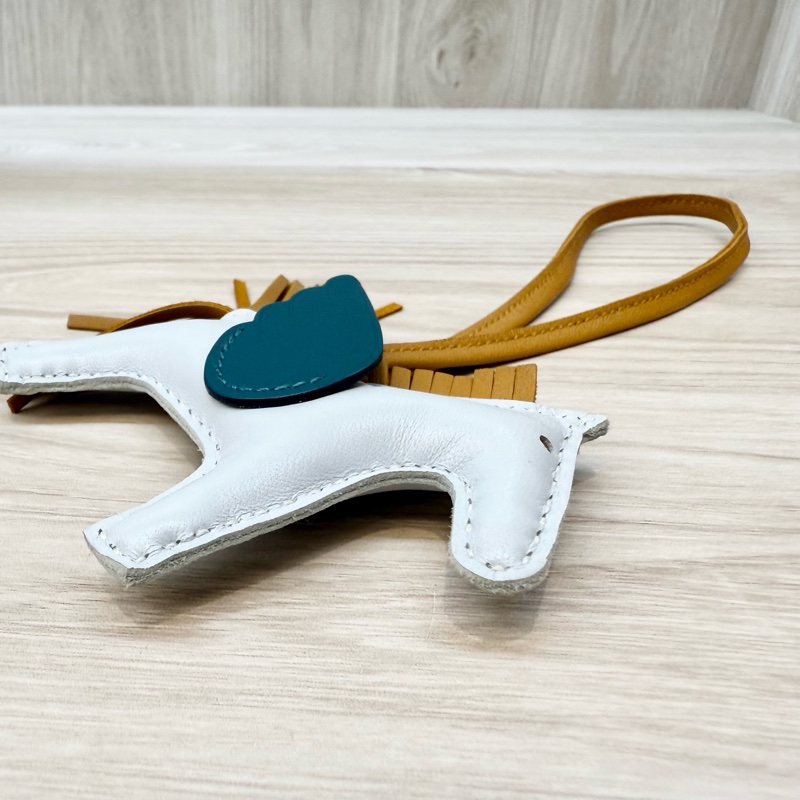 Hermes霾霧藍拚淺棕尾藍綠翅羊皮小飛馬吊飾RODEO PM-9