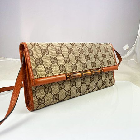 ＊奢華大道國際精品＊【G1798】GUCCI金棕色緹花布竹結磁釦手拿/斜背包 117594-11
