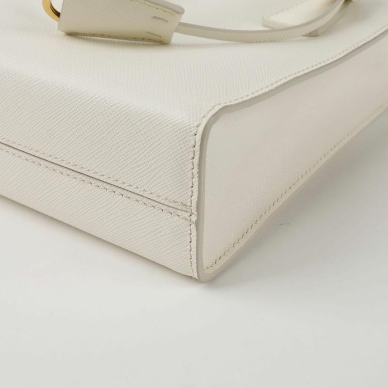 PRADA 1BA358 三角形標誌迷你手提單肩包-7