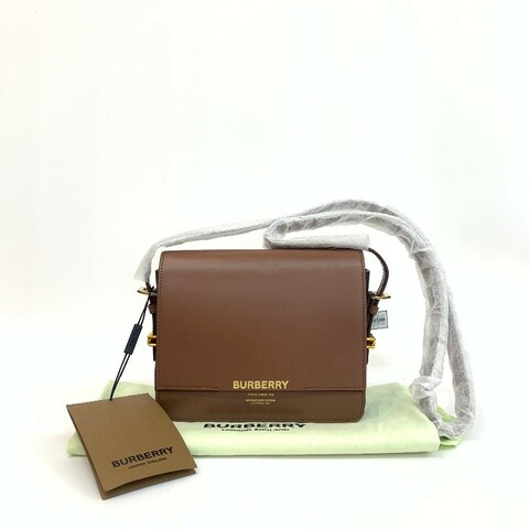 Burberry/巴寶莉棕色全皮單肩斜挎包。