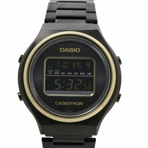 卡西歐 Casio TRON TRN50ZE1AJR 男士50週年紀念版數位腕錶，黑色和金色錶殼，不鏽鋼錶帶