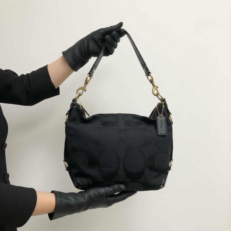 Coach 經典黑色 C Logo 緹花織布皮革肩背 Hobo 包(附購證、保卡)-0