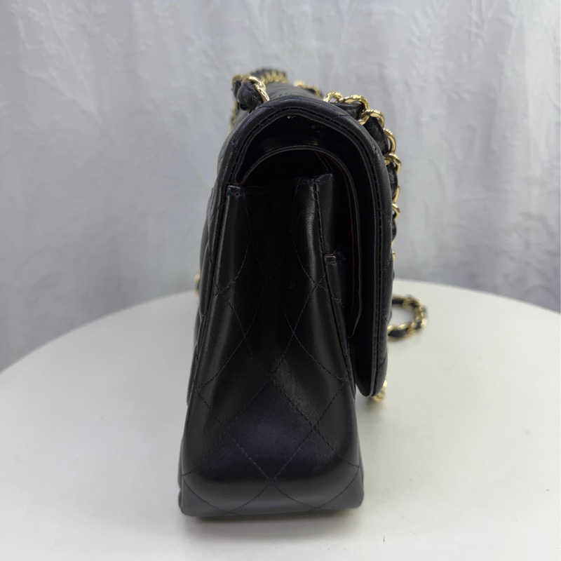 This is a Chanel Classic Double Flap bag in black leather with gold-tone hardware-5