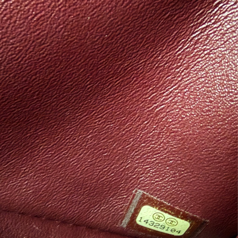 This is a Chanel Classic Double Flap bag in black leather with gold-tone hardware-10