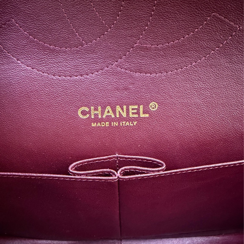 This is a Chanel Classic Double Flap bag in black leather with gold-tone hardware-13