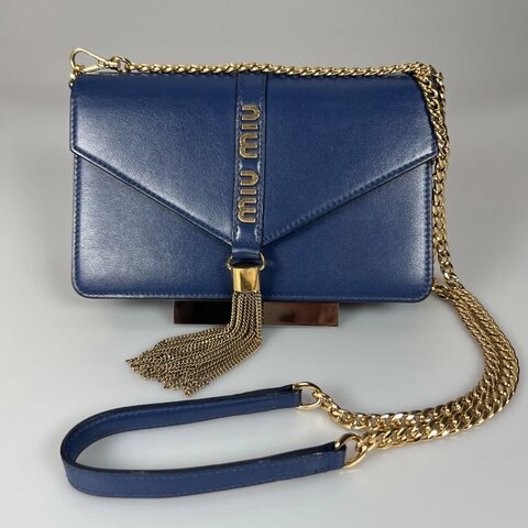 MIUMIU 藍皮革金扣流蘇