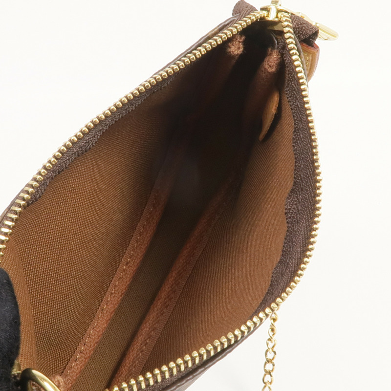 LOUIS VUITTON Monogram Mini Pochette Accessoires金扣手挽袋-11