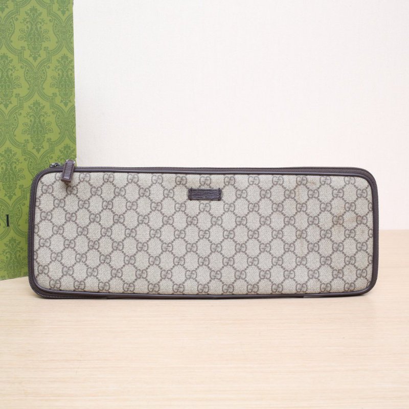 GUCCI 烏木色PVC老花領帶包手拿包肩背包-0