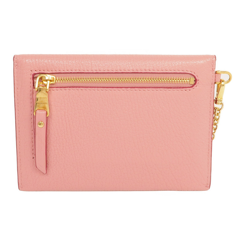 Miu Miu 牛皮皮革Pouch金扣手拿包-1