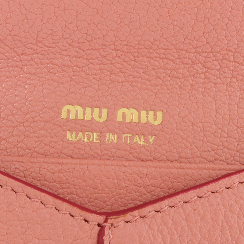 Miu Miu 牛皮皮革Pouch金扣手拿包-13