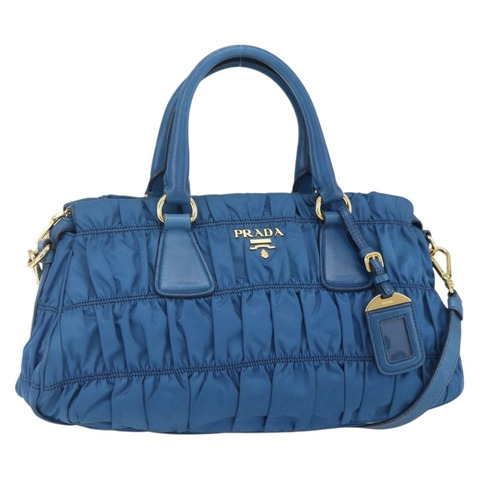 PRADA 尼龍材質雙肩包，藍色金色，正品編號 154697