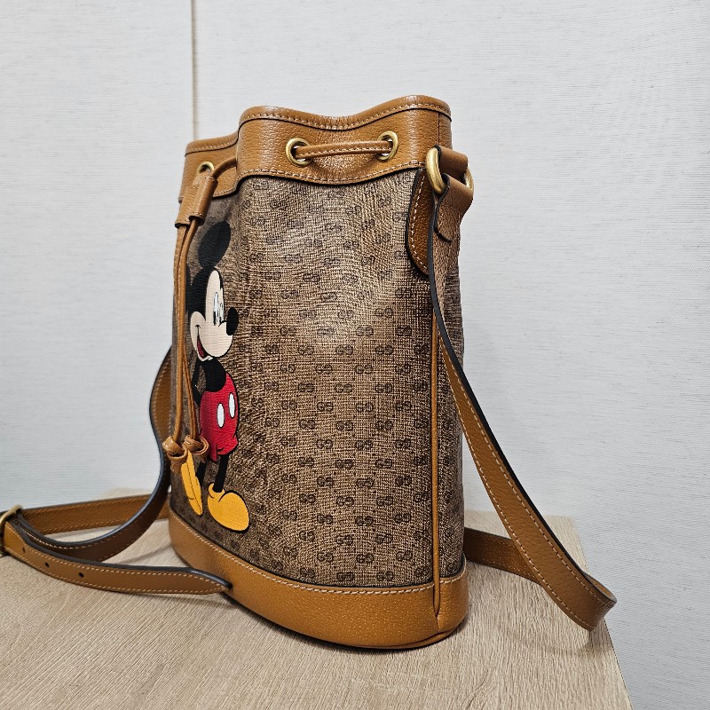 [聯名停產好物❣️甜價出] Gucci 老花米老鼠Disney束口斜背水桶包-1