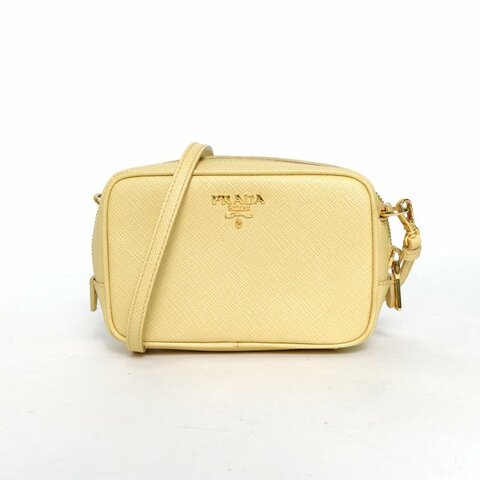 PRADA 黃色牛皮金扣十字紋相機包mini14.5肩背包