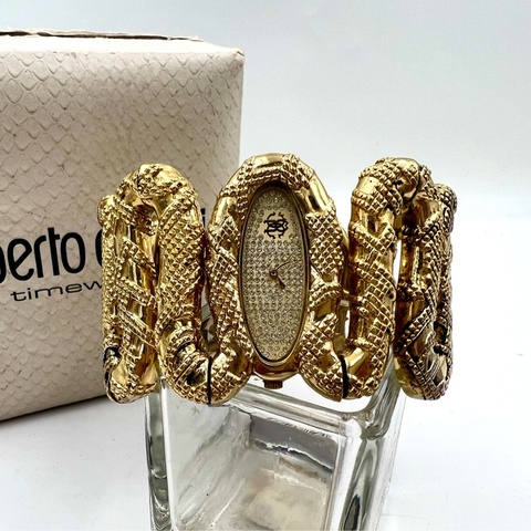 robertcavalli 金色蟒蛇造型手環錶。