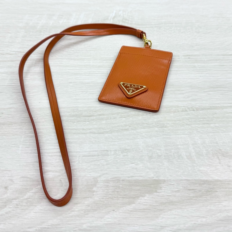 PRADA橘色三角金LOGO Saffiano掛繩證件套1MC007-0