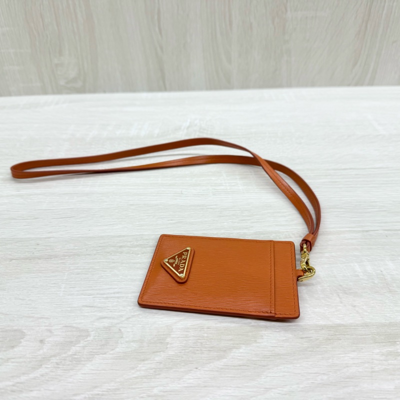 PRADA橘色三角金LOGO Saffiano掛繩證件套1MC007-3