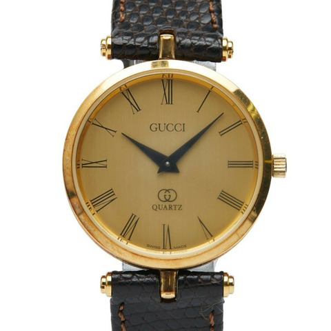 Gucci Sherry 系列石英腕錶，金色錶盤，不鏽鋼錶殼搭配皮革錶帶，女款
