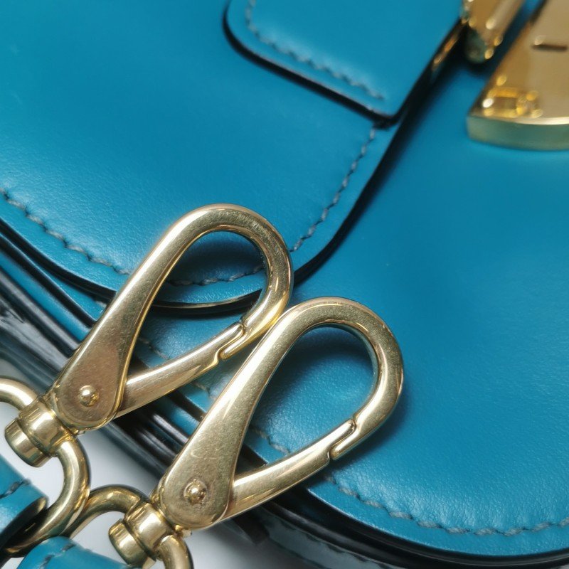 Miu Miu牛皮純色金屬鎖扣翻蓋斜挎包單肩包-14