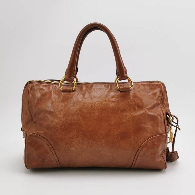 Prada油蠟皮純色字母logo拉鏈斜挎包單肩包-4