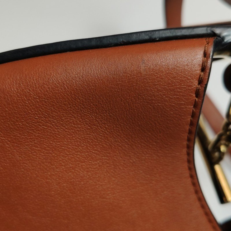 Loewe Joyce牛皮純色logo圓環斜挎包單肩包-17