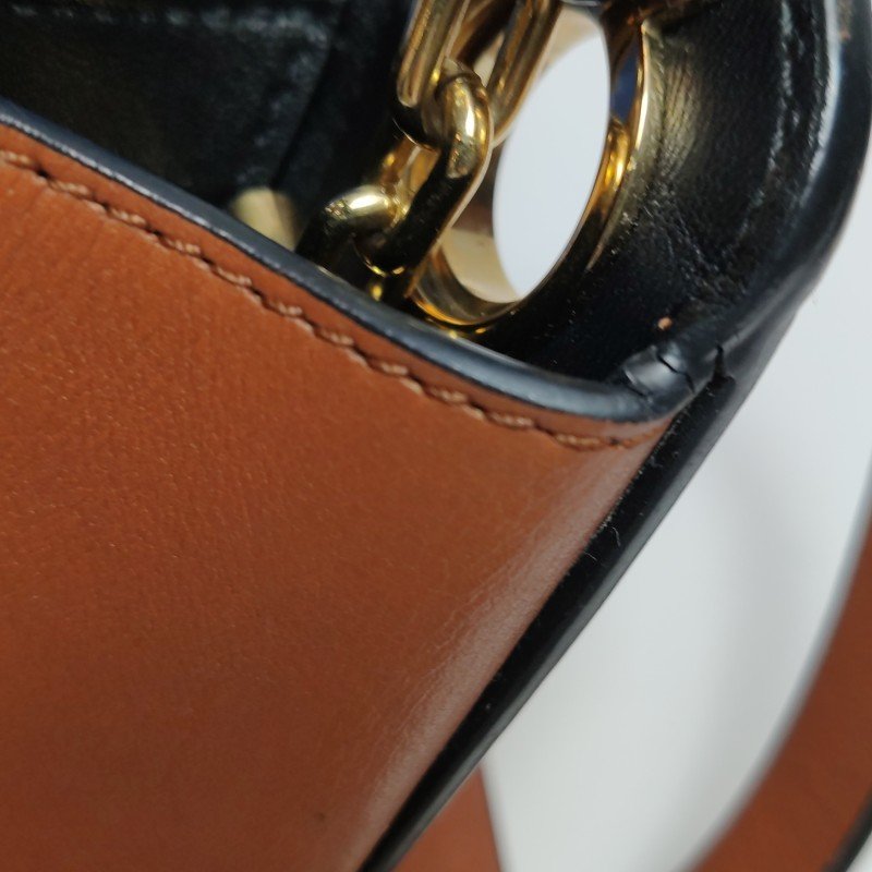 Loewe Joyce牛皮純色logo圓環斜挎包單肩包-19