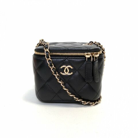 CHANEL 21P方盒子化妝包無鏡子11黑色羊皮31開金扣山茶花蝴蝶結皮穿鏈肩背包