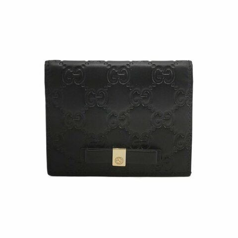 Gucci牛皮純色雙G老花壓紋蝴蝶結錢包