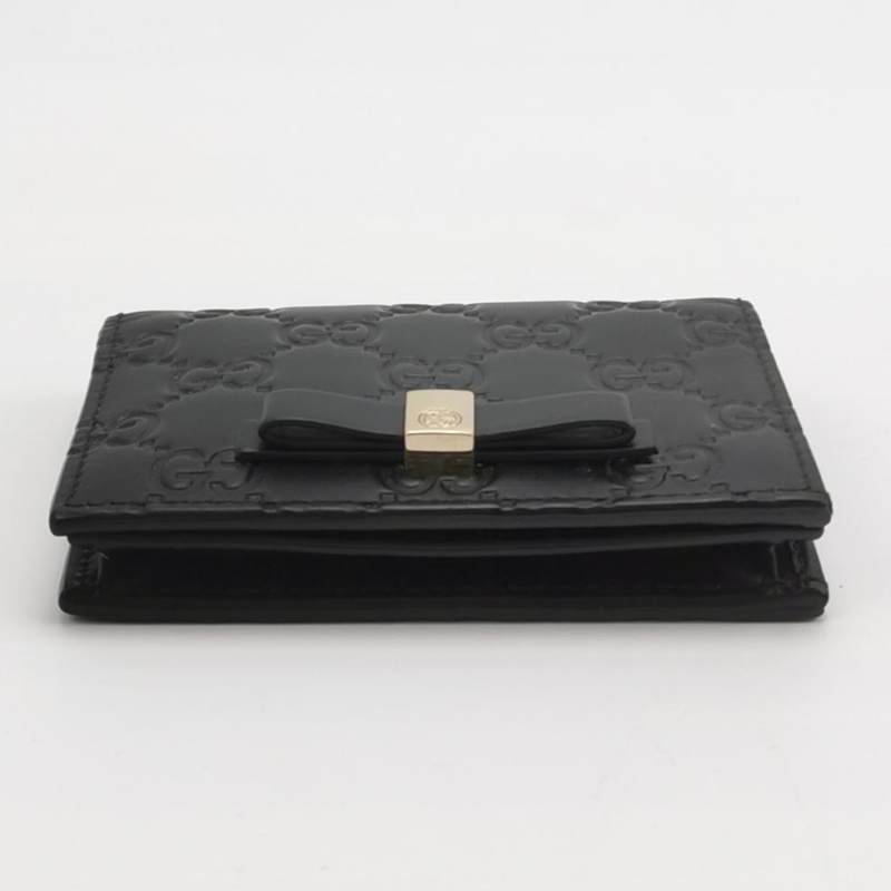 Gucci牛皮純色雙G老花壓紋蝴蝶結錢包-4