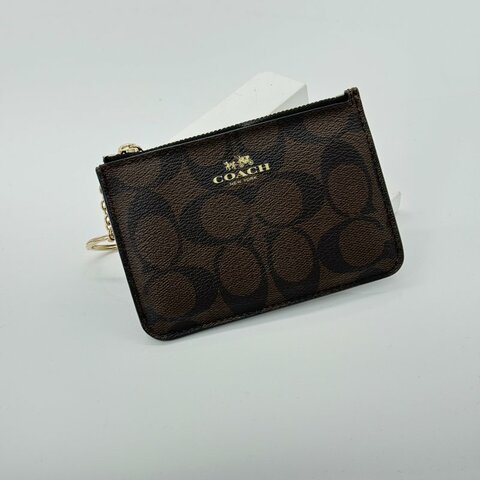 COACH 經典花紋零錢包