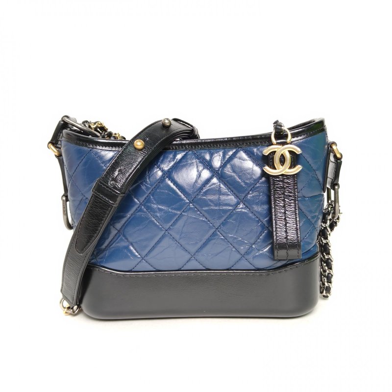 CHANEL GABRIELLE流浪小號20藍色牛皮26開金銀扣黑底肩背包-0