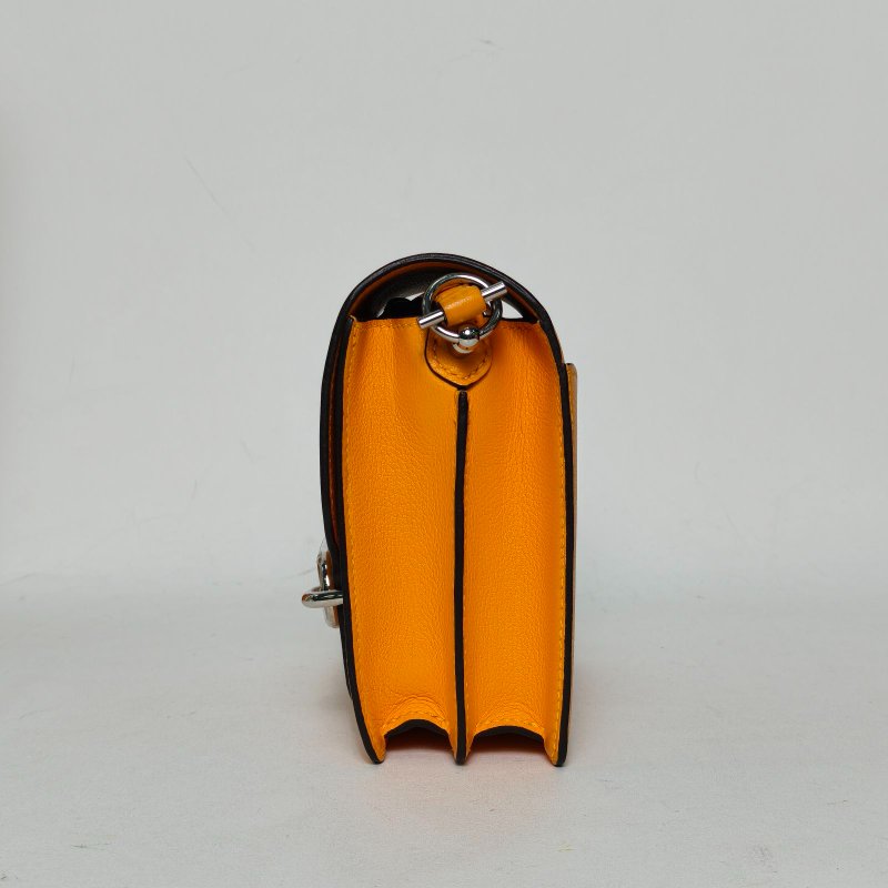 HERMES Roulis豬鼻子199V太陽黃EC皮A刻銀扣肩背包-1