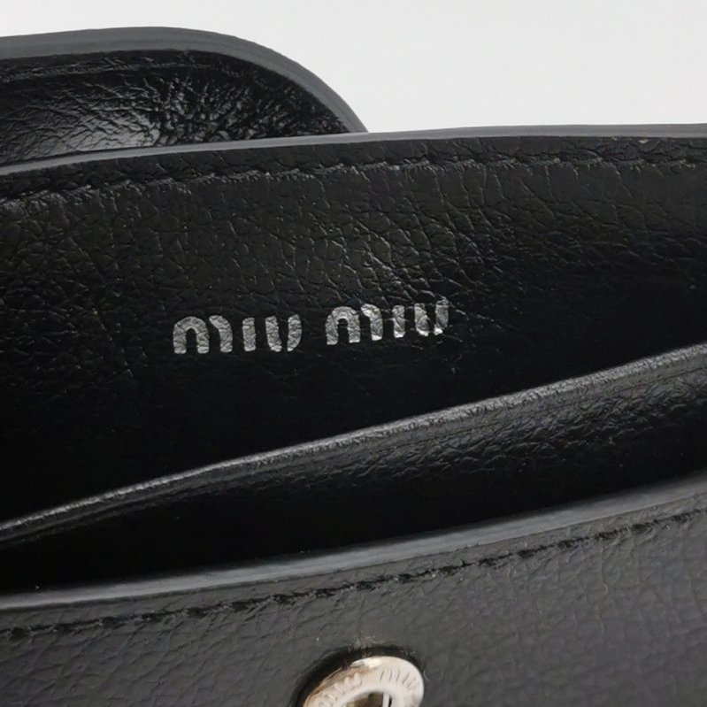 Miu Miu牛皮純色字母Logo流蘇斜挎包單肩包-7