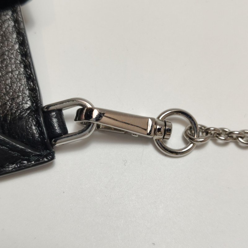 Miu Miu牛皮純色字母Logo流蘇斜挎包單肩包-11