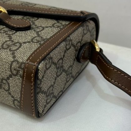 GUCCI烏木色PVC 1955橫式手機包-6