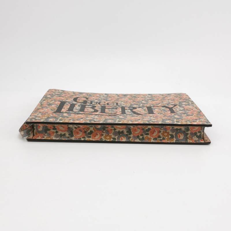 Gucci牛皮花卉滿印字母Logo拉鏈手拿包-4