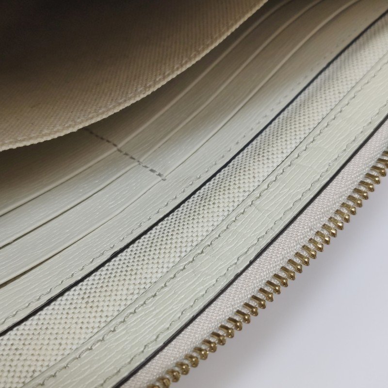 Gucci牛皮花卉滿印字母Logo拉鏈手拿包-9