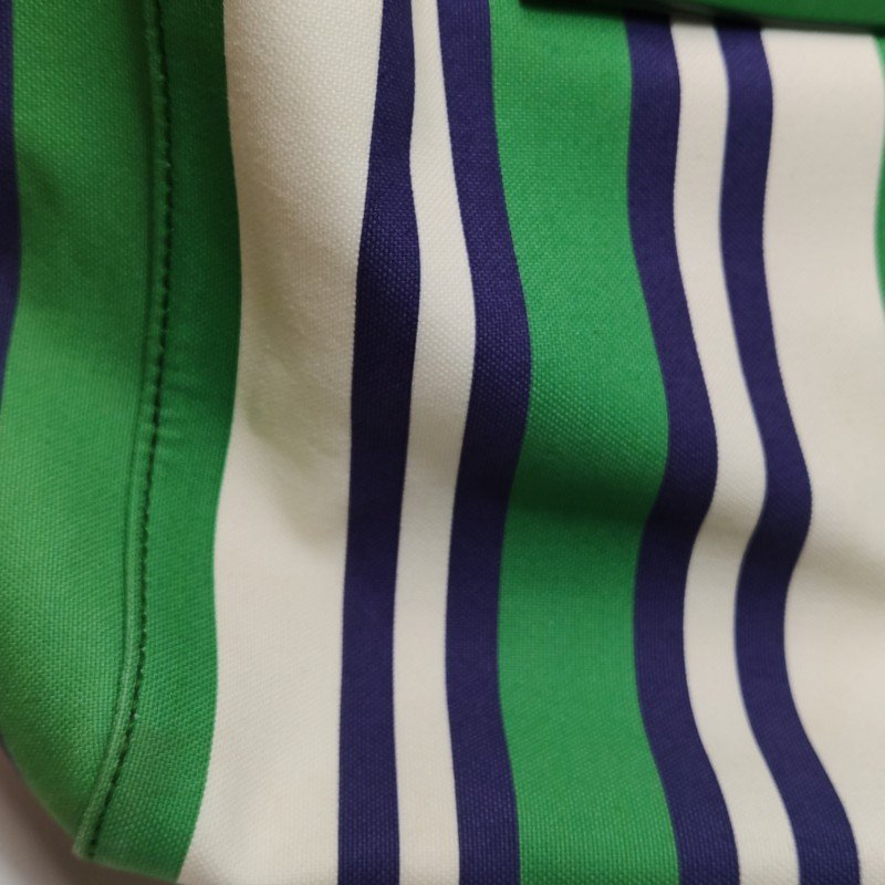 Miu Miu牛皮帆布撞色字母Logo斜挎包單肩包-17