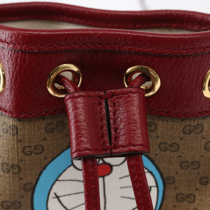 【日本直送】GUCCI Micro GG Supreme哆啦A夢聯名手提包 PVC 米色 647801 正品 146566SM-17