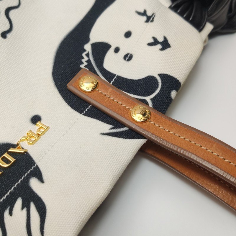 Prada牛皮羊皮帆布拼色印花字母Logo單肩包-9