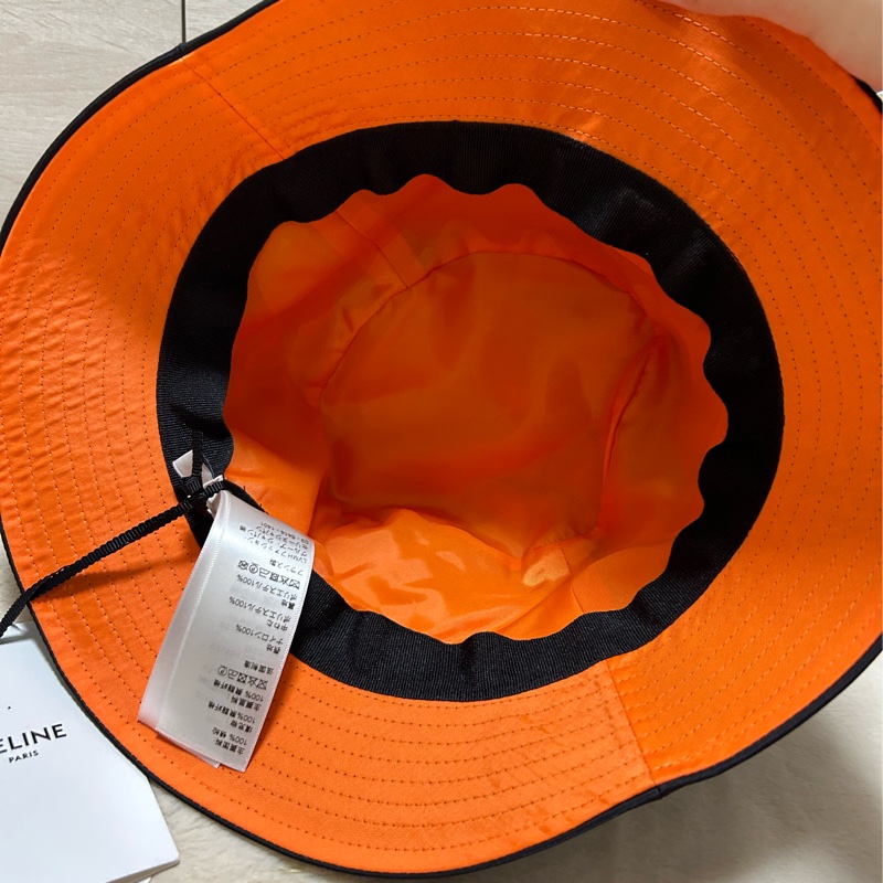 #全新閒置 CELINE 菱格絎逢尼龍漁夫帽(黑色L) 黑/橘-4